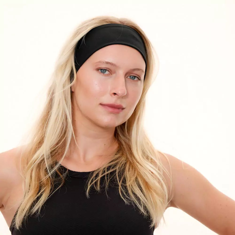 Black nylon and spandex athletic headband with hidden zipper pocket for storing valuables (cash, keys, AirPods). Soft and stretchy with strong elastic for a secure hold, perfect for workouts, festivals, gifts, and holiday stocking stuffers.