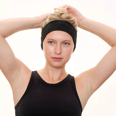 Black nylon and spandex athletic headband with hidden zipper pocket for storing valuables (cash, keys, AirPods). Soft and stretchy with strong elastic for a secure hold, perfect for workouts, festivals, gifts, and holiday stocking stuffers.