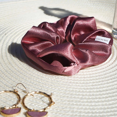 Satin dark pink hair scrunchie ponytail holder featuring a hidden zipper pocket for storing valuables (cash, keys, AirPods) and strong elastic for a secure hold. Perfect for workouts, festivals, gifts, and holiday stocking stuffers.