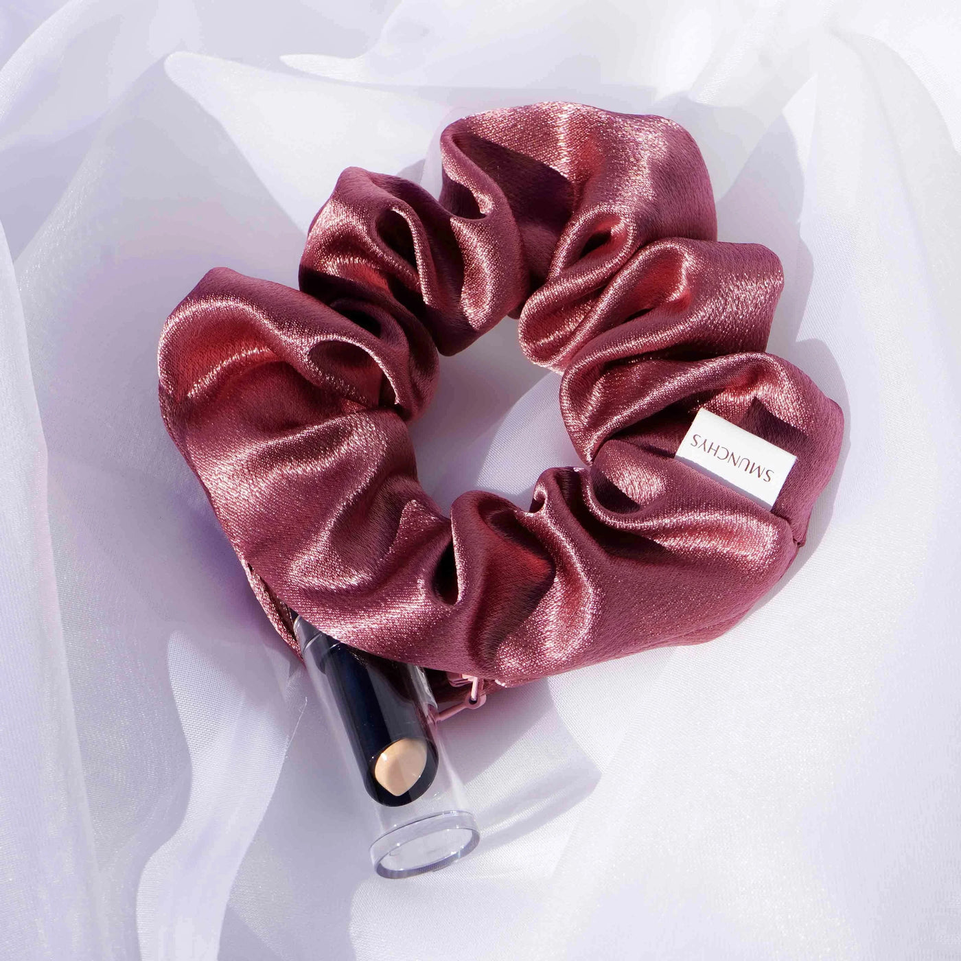 Satin dark pink hair scrunchie ponytail holder featuring a hidden zipper pocket for storing valuables (cash, keys, AirPods) and strong elastic for a secure hold. Perfect for workouts, festivals, gifts, and holiday stocking stuffers.