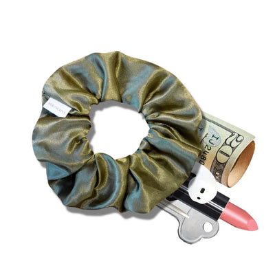 Satin green fall scrunchie with a hidden zipper pocket for valuables (cash, keys, AirPods), featuring strong elastic for a secure hold, inspired by the fall season, perfect for workouts and festivals.