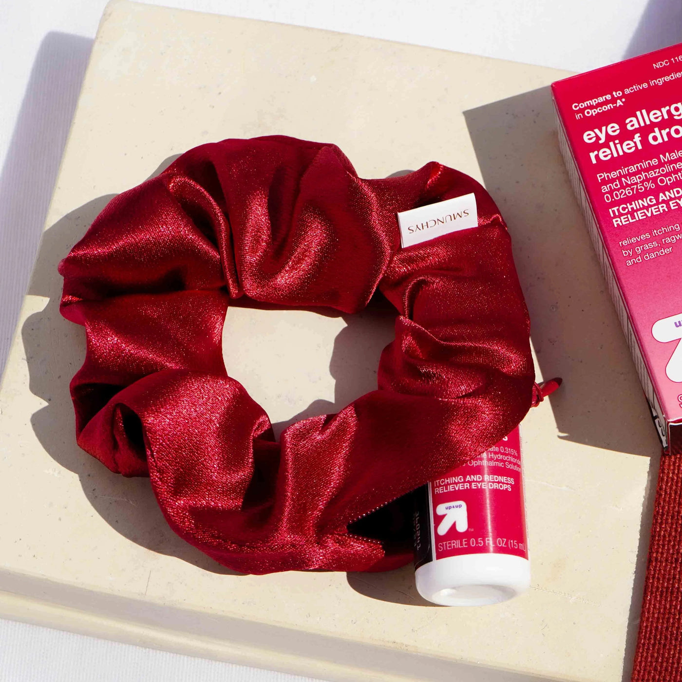 Satin red hair scrunchie ponytail holder featuring a hidden zipper pocket for storing valuables (cash, keys, AirPods) and strong elastic for a secure hold. Perfect for workouts, festivals, gifts, and holiday stocking stuffers.