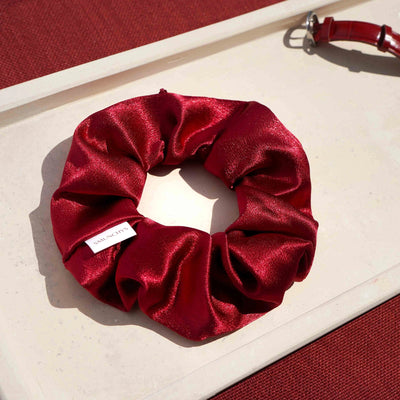 Satin red hair scrunchie ponytail holder featuring a hidden zipper pocket for storing valuables (cash, keys, AirPods) and strong elastic for a secure hold. Perfect for workouts, festivals, gifts, and holiday stocking stuffers.