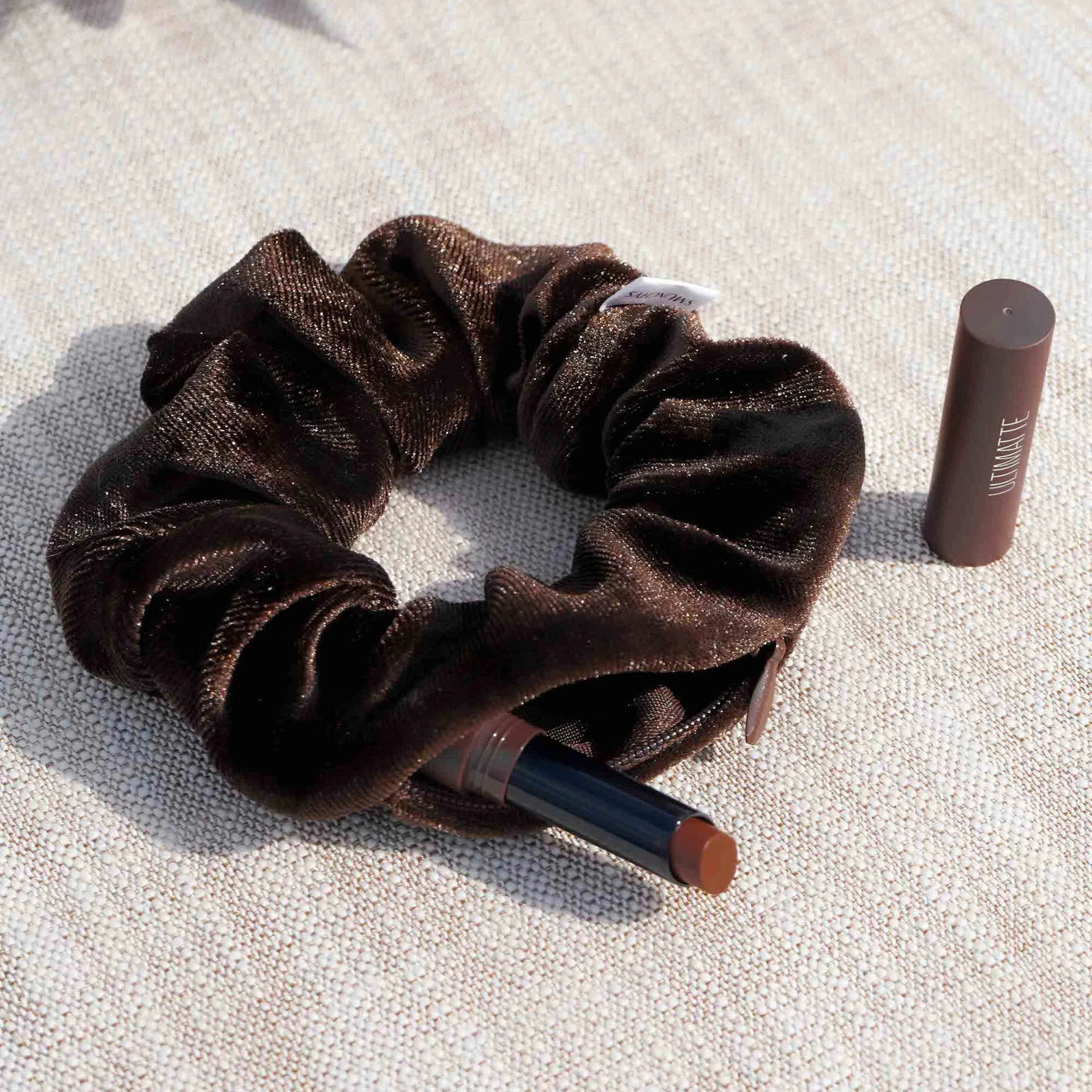 Velvet Brown coffee color hair scrunchie ponytail holder featuring a hidden zipper pocket for storing valuables (cash, keys, AirPods) and strong elastic for a secure hold. Ideal for workouts, festivals, gifts, and holiday stocking stuffers.