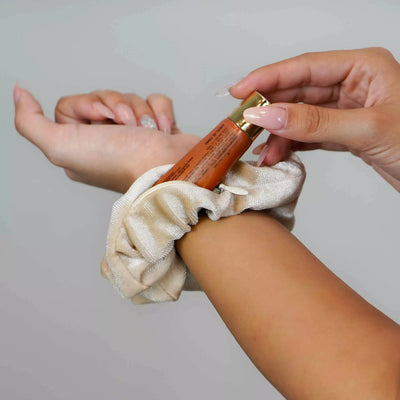 Velvet cream beige hair scrunchie ponytail holder featuring a hidden zipper pocket for storing valuables (cash, keys, AirPods) and strong elastic for a secure hold. Perfect for workouts, festivals, gifts, and holiday stocking stuffers.