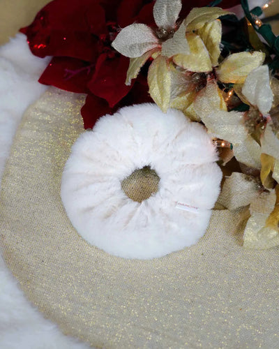 White faux fur holiday scrunchie with hidden zipper pocket for valuables (cash, keys, AirPods), featuring strong elastic for a secure hold. Inspired by the Christmas and winter season, perfect for workouts, festivals, holiday events, and stocking stuffers. 