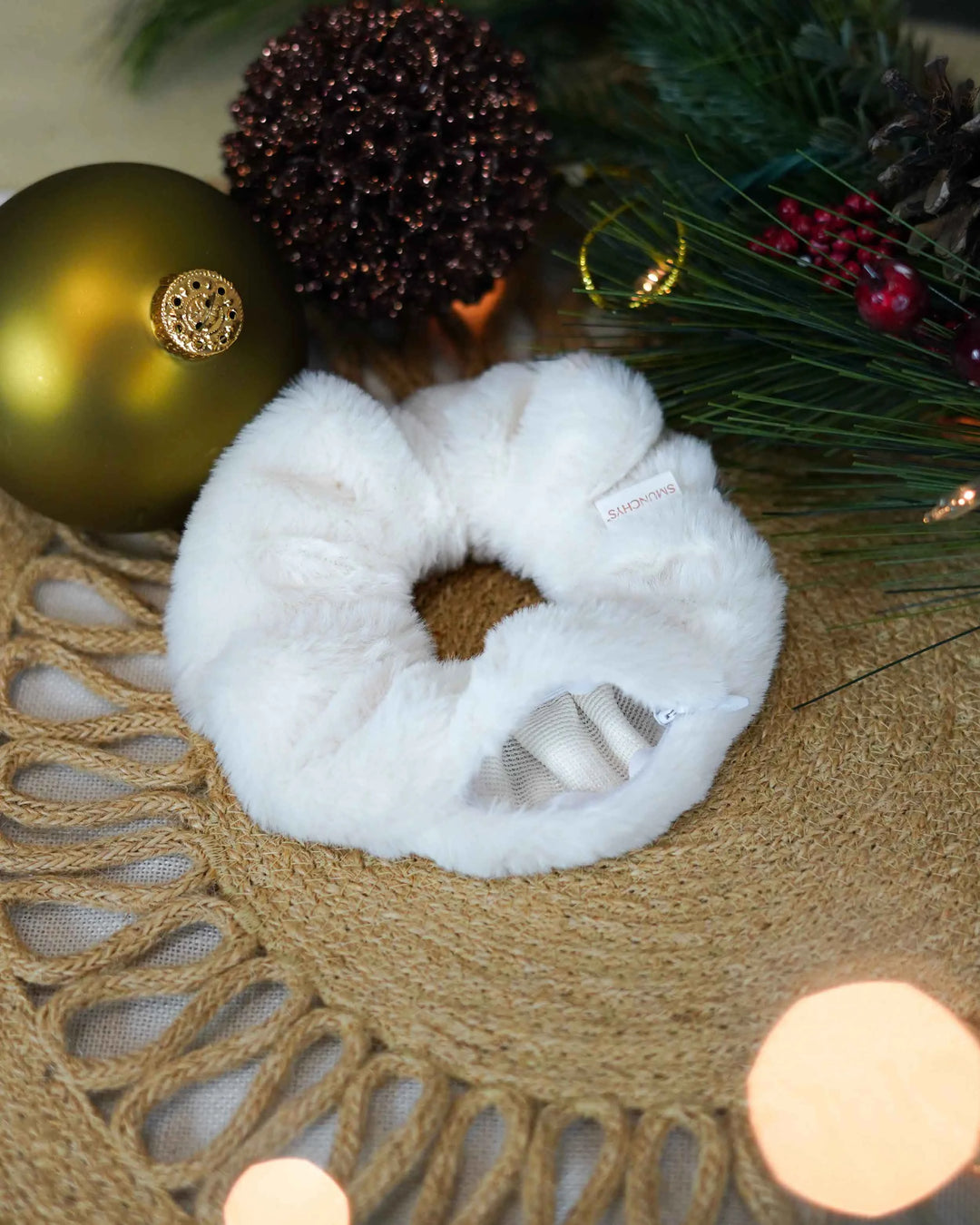 White faux fur holiday scrunchie with hidden zipper pocket for valuables (cash, keys, AirPods), featuring strong elastic for a secure hold. Inspired by the Christmas and winter season, perfect for workouts, festivals, holiday events, and stocking stuffers. 