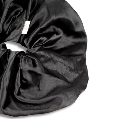 Satin black jumbo oversized hair scrunchie with hidden zipper pocket for valuables (cash, cards, keys, AirPods), strong elastic for secure hold, perfect for workouts, festivals, gifts, and holiday stocking stuffers. Oversized scrunchie ideal for thick hair and ponytails.