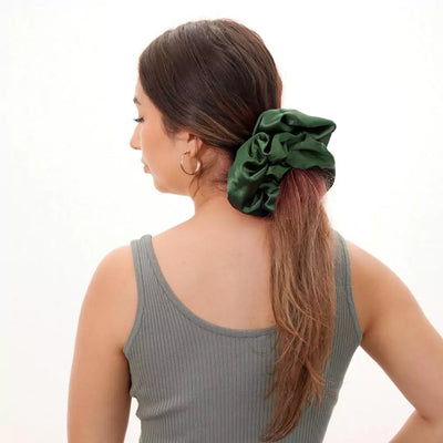 Satin green evergreen oversized jumbo hair scrunchie with hidden zipper pocket for valuables (cash, cards, keys, AirPods), strong elastic for secure hold, perfect for workouts, festivals, gifts, and holiday stocking stuffers. Oversized scrunchie ideal for thick hair and ponytails.