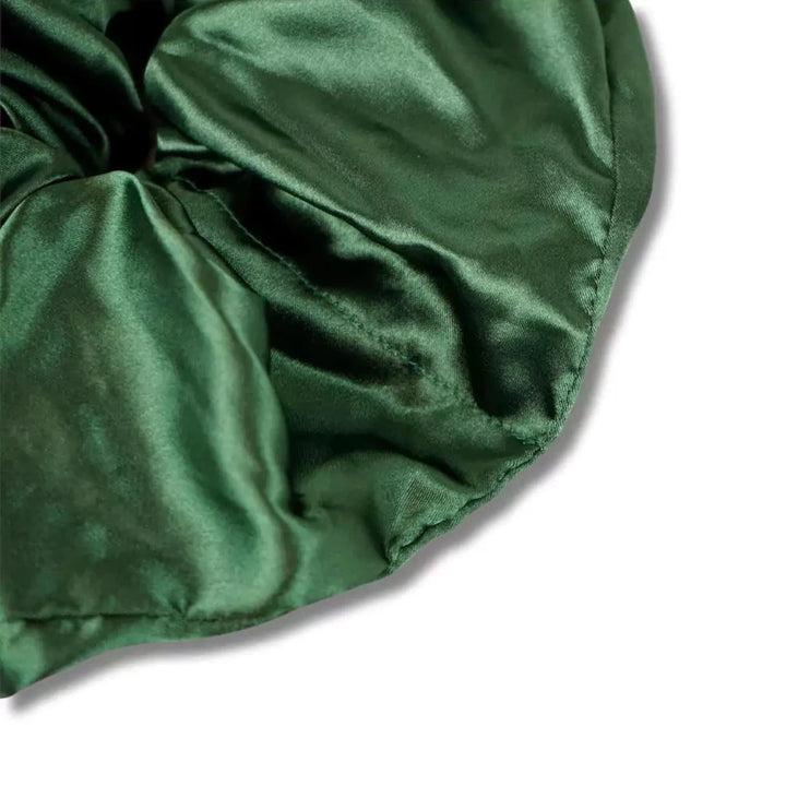 Satin green evergreen oversized jumbo hair scrunchie with hidden zipper pocket for valuables (cash, cards, keys, AirPods), strong elastic for secure hold, perfect for workouts, festivals, gifts, and holiday stocking stuffers. Oversized scrunchie ideal for thick hair and ponytails.