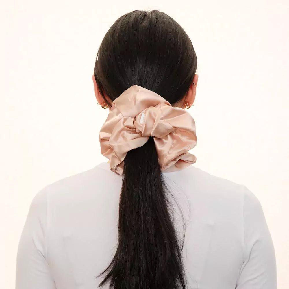 Satin pink salmon jumbo oversized hair scrunchie with hidden zipper pocket for valuables (cash, cards, keys, AirPods), strong elastic for secure hold, perfect for workouts, festivals, gifts, and holiday stocking stuffers. Oversized scrunchie ideal for thick hair and ponytails.