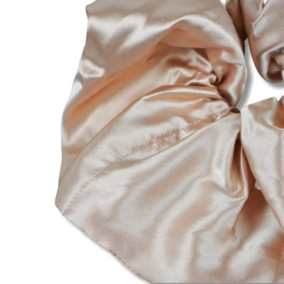 Satin pink salmon jumbo oversized hair scrunchie with hidden zipper pocket for valuables (cash, cards, keys, AirPods), strong elastic for secure hold, perfect for workouts, festivals, gifts, and holiday stocking stuffers. Oversized scrunchie ideal for thick hair and ponytails.